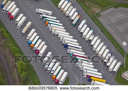 "Aerial view, trucks parked in a truck park, Kaufland logistics centre, Dortmund-Derne, Dortmund, North Rhine-Westphalia, Germany, Europe" View Large Photo Image Stock Photography - "Aerial view, trucks parked in a truck park, Kaufland logistics centre, Dortmund-Derne, Dortmund, North Rhine-Westphalia, Germany, Europe". Fotosearch
