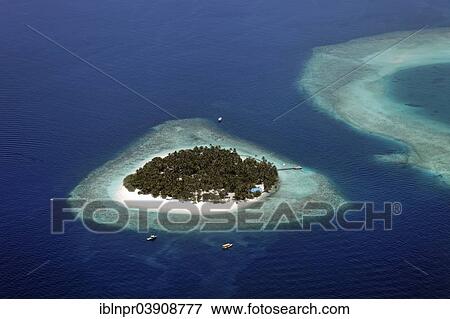 "Aerial view, uninhabited island of Kuda Bandos, North Male Atoll, Indian Ocean, Maldives, Asia" View Large Photo Image Stock Photo - "Aerial view, uninhabited island of Kuda Bandos, North Male Atoll, Indian Ocean, Maldives, Asia". Fotosearch