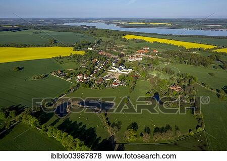"Aerial view, Village of Amt Malchin on Malchinger See lake, Basedow, Mecklenburg Lake District, Mecklenburg-Western Pomerania, Germany, Europe" View Large Photo Image Stock Photo - "Aerial view, Village of Amt Malchin on Malchinger See lake, Basedow, Mecklenburg Lake District, Mecklenburg-Western Pomerania, Germany, Europe". Fotosearch