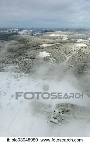 Stock Image - "Aerial view, weather station in the fog, in clouds, in winter, Mount Kahler Asten, Hochheide heathland, Winterberg, Winterberg, Sauerland, Hochsauerlandkreis, North Rhine-Westphalia, Germany, Europe". Fotosearch