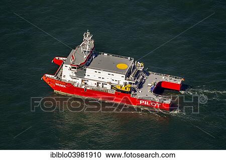 "Aerial view, """"Weser"""" pilot boat, shipping line, shipping route, at sea, coastal waters, off Wangerooge, North Sea, North Sea island, East Frisian Islands, Lower Saxony, Germany, Europe" View Large Photo Image Stock Image - "Aerial view, """"Weser"""" pilot boat, shipping line, shipping route, at sea, coastal waters, off Wangerooge, North Sea, North Sea island, East Frisian Islands, Lower Saxony, Germany, Europe". Fotosearch