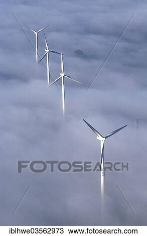 "Aerial view, wind turbines rising above the mist, Ochsenwerder, Hamburg, Hamburg, Germany, Europe" View Large Photo Image Stock Image - "Aerial view, wind turbines rising above the mist, Ochsenwerder, Hamburg, Hamburg, Germany, Europe". Fotosearch