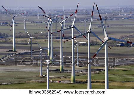 "Aerial view, wind turbines, wind farm, Brunsbuttel, Schleswig-Holstein, Germany, Europe" View Large Photo Image Stock Photo - "Aerial view, wind turbines, wind farm, Brunsbuttel, Schleswig-Holstein, Germany, Europe". Fotosearch