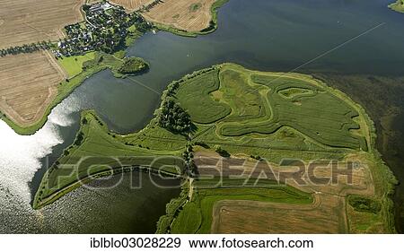 Stock Photo - "Aerial view, Zudar peninsula, Schoritzer Wiek bay, Heidekaten, in Garz on the island of Ruegen, Klein Zicker, Thiessow, Mecklenburg-Western Pomerania, Germany, Europe". Fotosearch