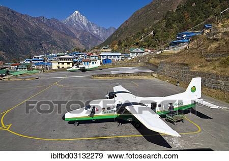 Stock Photo - "Aeroplane getting ready to depart at Lukla Airport, Lukla, Solukhumbu District, Sagarmatha Zone, Nepal, Asia". Fotosearch