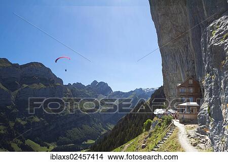 "Aescher mountain inn with paragliders and a view of the Seealpsee Lake and the Meglisalp, Wasserauen, Appenzell Innerrhoden, Appenzell Inner Rhodes, Switzerland, Europe, PublicGround, Europe" View Large Photo Image Picture - "Aescher mountain inn with paragliders and a view of the Seealpsee Lake and the Meglisalp, Wasserauen, Appenzell Innerrhoden, Appenzell Inner Rhodes, Switzerland, Europe, PublicGround, Europe". Fotosearch