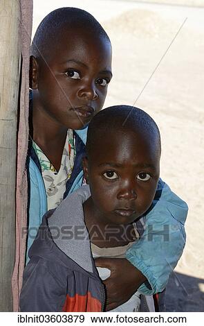 Stock Photo - "African boys, approx 8 and 9 years, Karas Region, Namibia, Africa". Fotosearch