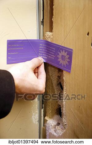 "After the completion of the gathering of forensic evidence, a broken in apartment door is closed with a police seal, officer of the C. I. D., the Criminal Investigation Department, working at the scene of a crime, re-enacted scene" View Large Photo Image Picture - "After the completion of the gathering of forensic evidence, a broken in apartment door is closed with a police seal, officer of the C. I. D., the Criminal Investigation Department, working at the scene of a crime, re-enacted scene". Fotosearch