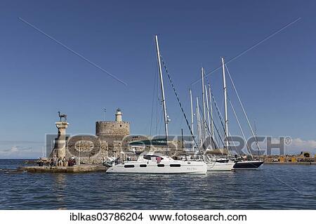 "Agios Nikolaos fortress, Mandraki Harbour, Rhodes, Rhodes island, Dodecanese, Greece, Europe" View Large Photo Image Picture - "Agios Nikolaos fortress, Mandraki Harbour, Rhodes, Rhodes island, Dodecanese, Greece, Europe". Fotosearch