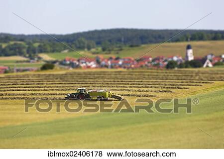 "Agricultural machine working in the fields, tilt-shift effect, Honau, Baden-Wuerttemberg, Germany, Europe, PublicGround, Europe" View Large Photo Image Stock Photo - "Agricultural machine working in the fields, tilt-shift effect, Honau, Baden-Wuerttemberg, Germany, Europe, PublicGround, Europe". Fotosearch