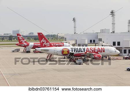 "Air Asia airplanes at Don Muang airport, Bangkok, Thailand, Asia" View Large Photo Image Picture - "Air Asia airplanes at Don Muang airport, Bangkok, Thailand, Asia". Fotosearch