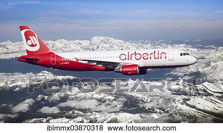 "Air Berlin Airbus A320-214 in flight over the Alps, Switzerland, Europe" View Large Photo Image Stock Photo - "Air Berlin Airbus A320-214 in flight over the Alps, Switzerland, Europe". Fotosearch