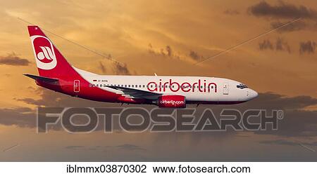 Air Berlin Boeing 737-73S in flight during a thunderstorm in the evening light View Large Photo Image Stock Image - Air Berlin Boeing 737-73S in flight during a thunderstorm in the evening light. Fotosearch