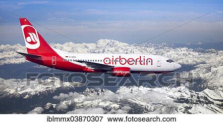 "Air Berlin Boeing 737-73S in flight over the Alps, Switzerland, Europe" View Large Photo Image Stock Photo - "Air Berlin Boeing 737-73S in flight over the Alps, Switzerland, Europe". Fotosearch