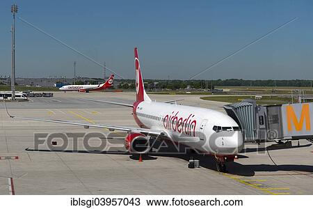"Air Berlin Boeing 737-8BK, at the back an Air Berlin Boeing 737-86J, Munich Airport, Upper Bavaria, Germany, Europe" View Large Photo Image Stock Image - "Air Berlin Boeing 737-8BK, at the back an Air Berlin Boeing 737-86J, Munich Airport, Upper Bavaria, Germany, Europe". Fotosearch