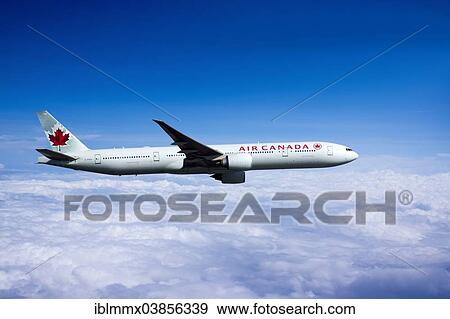 "Air Canada, Boeing 777-333 ER, in flight" View Large Photo Image Stock Photo - "Air Canada, Boeing 777-333 ER, in flight". Fotosearch