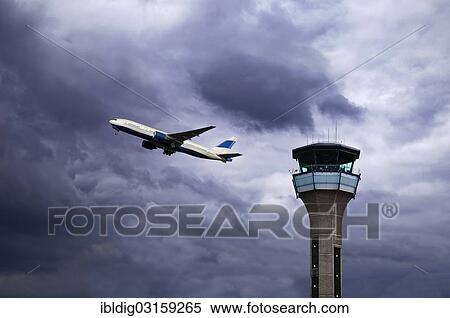 "Air traffic control tower with a plane taking off, Luton Airport, Luton, Bedfordshire, United Kingdom, Europe" View Large Photo Image Stock Photography - "Air traffic control tower with a plane taking off, Luton Airport, Luton, Bedfordshire, United Kingdom, Europe". Fotosearch