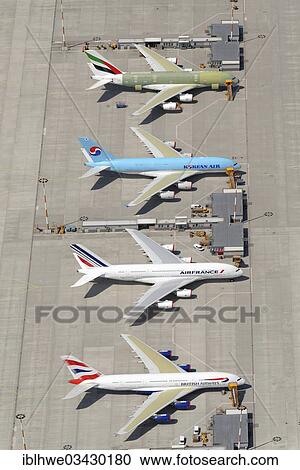 "Airbus A380 airplanes for British Airways, Airfrance, Korean Air and Emirates prepared for delivery at the factory airfield of Finkenwerder, Finkenwerder, Hamburg, Hamburg, Germany, Europe" View Large Photo Image Stock Image - "Airbus A380 airplanes for British Airways, Airfrance, Korean Air and Emirates prepared for delivery at the factory airfield of Finkenwerder, Finkenwerder, Hamburg, Hamburg, Germany, Europe". Fotosearch