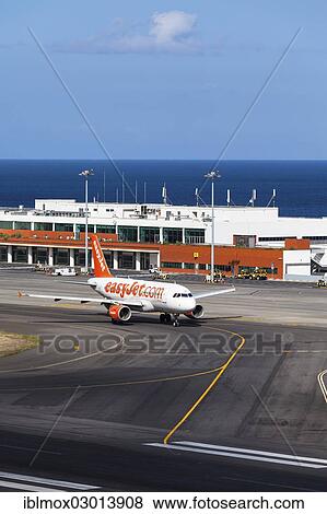Stock Photo - "Airbus from easyjet. com in front of the terminal of Madeira Airport, LPMA, also known as Funchal Airport and Santa Catarina Airport, Santa Catarina, Funchal, Madeira, Portugal, Europe". Fotosearch