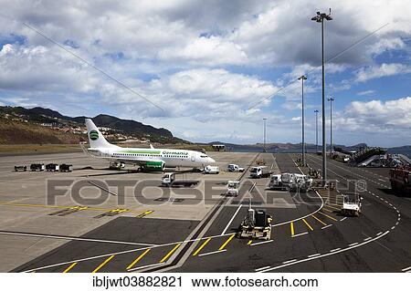 Stock Image - "Aircraft of the Germania Airlines on the runway, Funchal Airport, Funchal, Madeira Island, Portugal, Europe". Fotosearch