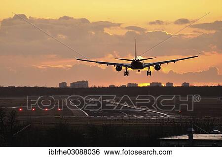 Stock Photograph - "Airplane landing at Tegel Airport, Berlin, Germany, Europe". Fotosearch