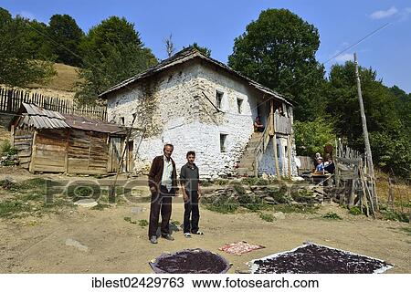 "Albanian family in front of their old farmhouse in Cerem, Valbona National Park, Albanian Alps, Albania, The Balkans, Europe" View Large Photo Image Stock Image - "Albanian family in front of their old farmhouse in Cerem, Valbona National Park, Albanian Alps, Albania, The Balkans, Europe". Fotosearch