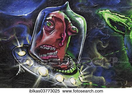 "Alien in a UFO, graffiti, North Rhine-Westphalia, Germany, Europe" View Large Photo Image Stock Photography - "Alien in a UFO, graffiti, North Rhine-Westphalia, Germany, Europe". Fotosearch