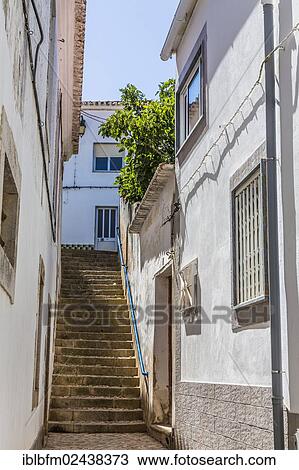 "Alley, fishing village of Ferragudo, Algarve, Portugal, Europe" View Large Photo Image Stock Image - "Alley, fishing village of Ferragudo, Algarve, Portugal, Europe". Fotosearch