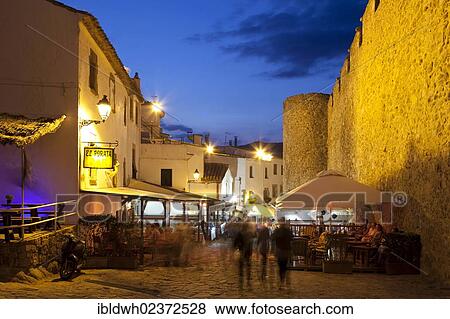 "Alley in the historic district of Vila Vella at night, Tossa de Mar, Costa Brava, Catalonia, Spain, Europe, PublicGround, Europe" View Large Photo Image Stock Photo - "Alley in the historic district of Vila Vella at night, Tossa de Mar, Costa Brava, Catalonia, Spain, Europe, PublicGround, Europe". Fotosearch