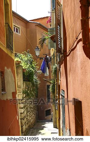 Alley with drying laundry, old town, Nice, Cote d'Azur, France, Europe View Large Photo Image Stock Photography - Alley with drying laundry, old town, Nice, Cote d'Azur, France, Europe. Fotosearch