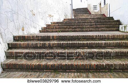 Stock Photograph - "Alleyway in the historic centre, Arcos de la Frontera, Province of Cadiz, Andalusia, Spain, Europe". Fotosearch