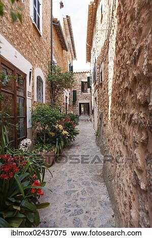 Stock Photography - "Alleyway in the old town of Fornalutx, Mallorca, Majorca, Balearic Islands, Spain, Europe". Fotosearch