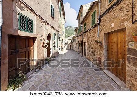 "Alleyway in the old town of Valldemossa, Serra de Tramuntana, Northwestern Coast, Mallorca, Majorca, Balearic Islands, Spain, Europe" View Large Photo Image Stock Photo - "Alleyway in the old town of Valldemossa, Serra de Tramuntana, Northwestern Coast, Mallorca, Majorca, Balearic Islands, Spain, Europe". Fotosearch