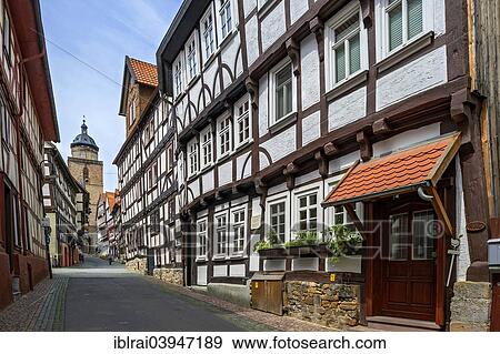 Alleyway With Half Timbered Houses And Tower Of Walpurgis Church