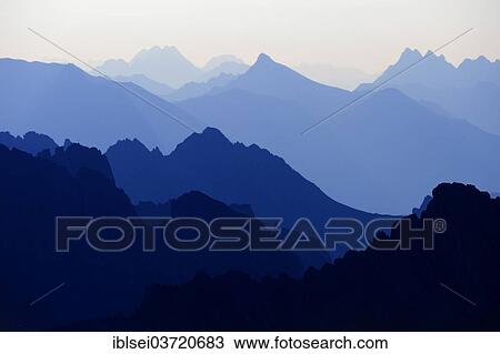 Stock Image - "Allgaeu Alps during the blue hour, Allgauer Alpen, Tyrol, Austria, Europe". Fotosearch
