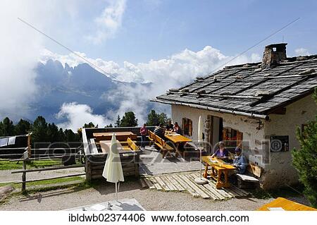 Stock Photograph - "Alm Cason mountain cabin, Raschoetz near St. Ulrich or Ortisei, Val Gardena valley or Groednertal valley, province of Bolzano-Bozen, Alto Adige, Italy, Europe". Fotosearch