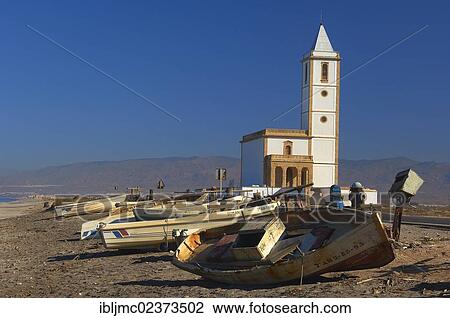 "Almadrava de Monteleva, San Miguel Church, fishing boat, beach, Cabo de Gata-Nijar Natural Park, Almeria, Spain, Europe" View Large Photo Image Stock Image - "Almadrava de Monteleva, San Miguel Church, fishing boat, beach, Cabo de Gata-Nijar Natural Park, Almeria, Spain, Europe". Fotosearch