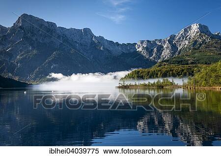 "Almsee in autumn, Zwolferkogel, Einserkogel, Big Woising, Totes Gebirge mountains, Grunau, Almtal, Salzkammergut, Upper Austria, Austria, Europe" View Large Photo Image Stock Photography - "Almsee in autumn, Zwolferkogel, Einserkogel, Big Woising, Totes Gebirge mountains, Grunau, Almtal, Salzkammergut, Upper Austria, Austria, Europe". Fotosearch