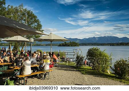 Stock Image - "Alpenblick"""" beer garden at Staffelsee Lake, near Uffing, Upper Bavaria, Bavaria, Germany, Europe". Fotosearch