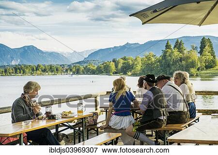 Stock Photo - "Alpenblick"""" beer garden at Staffelsee Lake, near Uffing, Upper Bavaria, Bavaria, Germany, Europe". Fotosearch