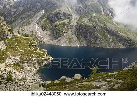 "Alpine hut at the Lago della Crosa mountain lake, Bavona Valley, Val Calneggia, Valle Maggia, Ticino, Switzerland, Europe" View Large Photo Image Stock Image - "Alpine hut at the Lago della Crosa mountain lake, Bavona Valley, Val Calneggia, Valle Maggia, Ticino, Switzerland, Europe". Fotosearch