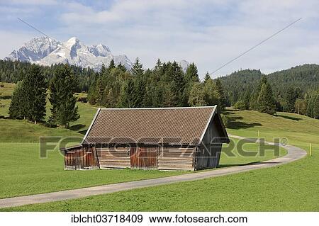 "Alpine meadow with a mountain hut in front of the Wetterstein Mountains, Buckelwiesen, Werdenfelser Land, Upper Bavaria, Bavaria, Germany, Europe" View Large Photo Image Stock Photo - "Alpine meadow with a mountain hut in front of the Wetterstein Mountains, Buckelwiesen, Werdenfelser Land, Upper Bavaria, Bavaria, Germany, Europe". Fotosearch