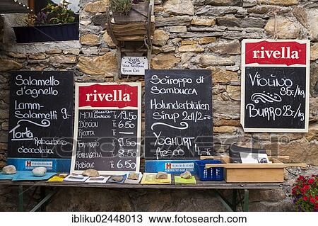 Stock Image - "Alpine products for sale on the Alpe Cedullo on Gambarogno, Ticino, Switzerland, Europe". Fotosearch
