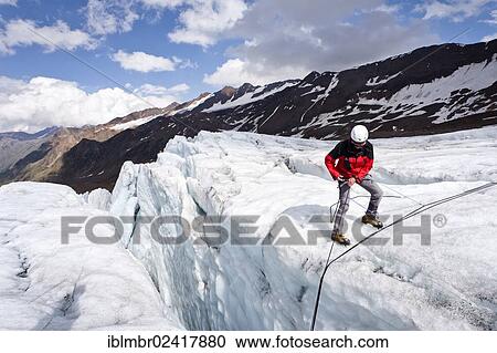 Alpinist at a crevasse rescue on Zufallferner glacier in the Martelltal valley, province of Bolzano-Bozen, Italy, Europe View Large Photo Image Stock Image - Alpinist at a crevasse rescue on Zufallferner glacier in the Martelltal valley, province of Bolzano-Bozen, Italy, Europe. Fotosearch