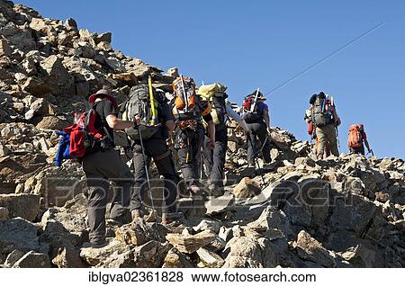 "Alpinists during the ascent of Mont Blanc along the regular route via Gouter Hut, Chamonix, Haute Savoie, France, Europe" View Large Photo Image Stock Photo - "Alpinists during the ascent of Mont Blanc along the regular route via Gouter Hut, Chamonix, Haute Savoie, France, Europe". Fotosearch