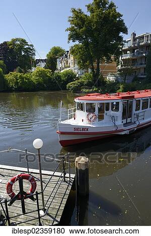 "Alster river steamer on Osterbekkanal canal, Muehlenkamp pier, Hamburg, Hamburg, Germany, Europe" View Large Photo Image Stock Image - "Alster river steamer on Osterbekkanal canal, Muehlenkamp pier, Hamburg, Hamburg, Germany, Europe". Fotosearch