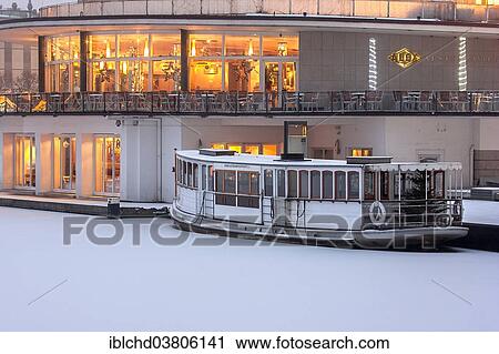 "Alsterpavillon with the Alster steamer St. George on this frozen Alster Lake in the morning, Jungfernstieg, Hamburg, Germany, Europe" View Large Photo Image Stock Image - "Alsterpavillon with the Alster steamer St. George on this frozen Alster Lake in the morning, Jungfernstieg, Hamburg, Germany, Europe". Fotosearch