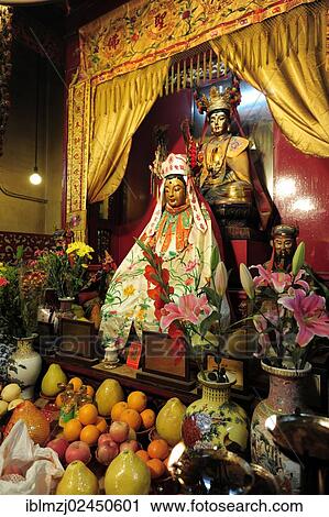 Stock Image - "Altar in a Chinese temple in the Sheung Wan quarter, Hong Kong Island, Hong Kong, China, Asia". Fotosearch