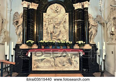 Stock Image - "Altar on the grave of the Apostle St. Boniface, relief images by Johann Neudecker, Boniface Crypt, Cathedral of St. Salvator, Fulda, Hesse, Germany, Europe". Fotosearch