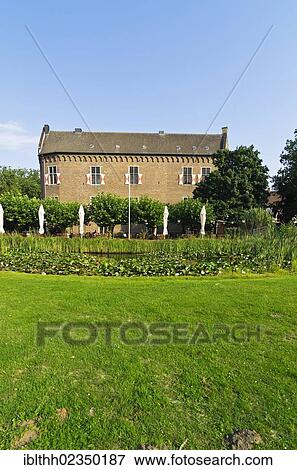 "Altes Schloss, old castle, with terrace of the restaurant and pond, Grevenbroich, North Rhine-Westphalia, Germany, Europe" View Large Photo Image Stock Photo - "Altes Schloss, old castle, with terrace of the restaurant and pond, Grevenbroich, North Rhine-Westphalia, Germany, Europe". Fotosearch